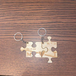 Portachiavi in legno a forma di puzzle